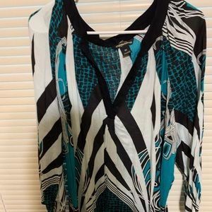 Millenium teal and black shirt